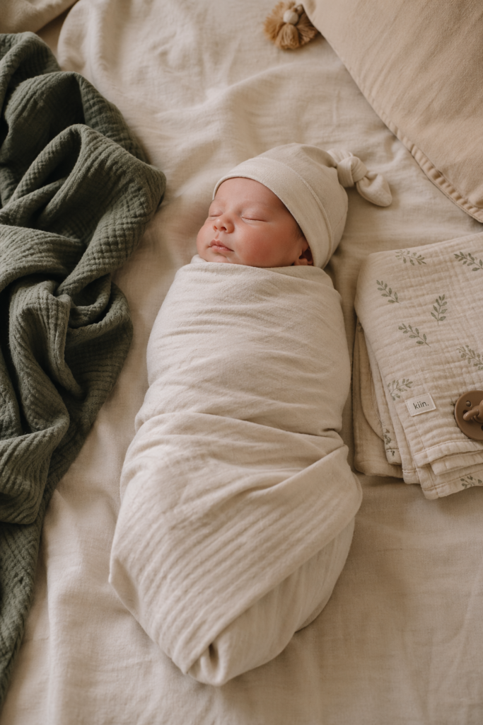 best swaddles for newborns cozy baby wrapped in muslin blanket